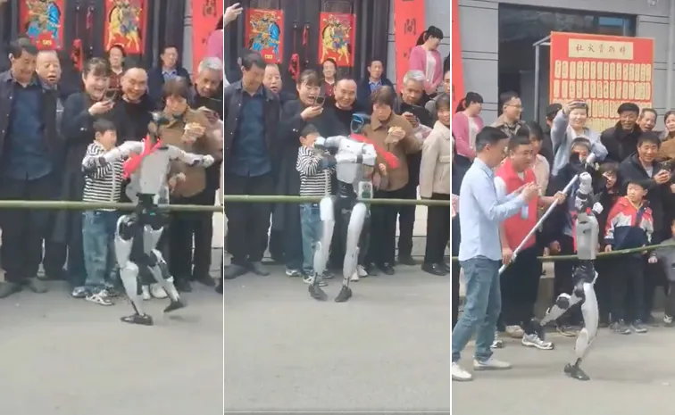 Dancing Robot Slaps Child In Face At Public Show In China