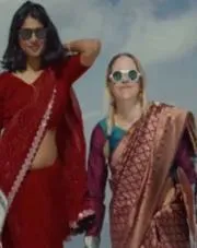 2 Saree-Clad Women Snowboarding In Kashmir 