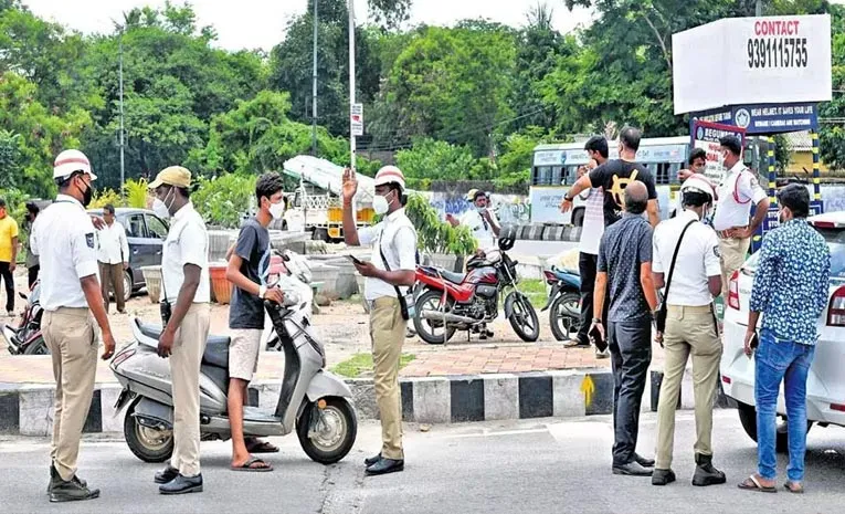 cyberabad traffic police helmet strap rule drive fines