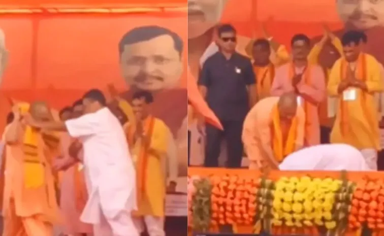 Suvendu Adhikari touches UP CM Yogi Adityanath's feet at Bengal rally