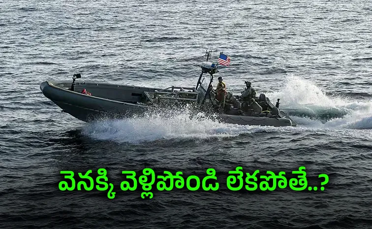 US helicopter gunner warns ship near iran port