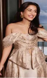 Radhika Merchant stuns as modern-day Belle in gold couture  in Venice