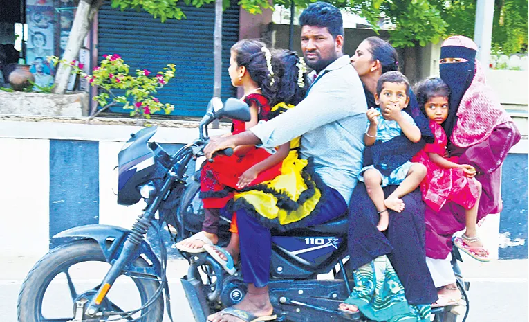 seven people travel on single bike in anantapur
