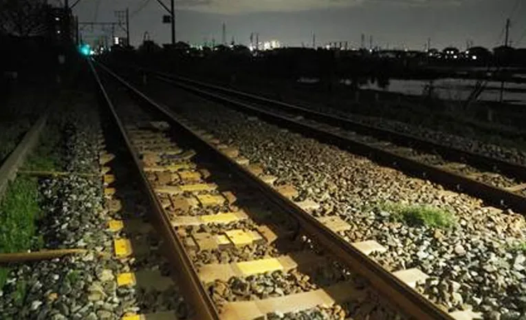 Family commits suicide by jumping under a train in Singarayakonda.