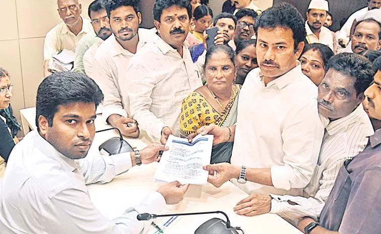 Visakhapatnam KK Raju Demands Action On Encroachments In Government Land At Kapparada