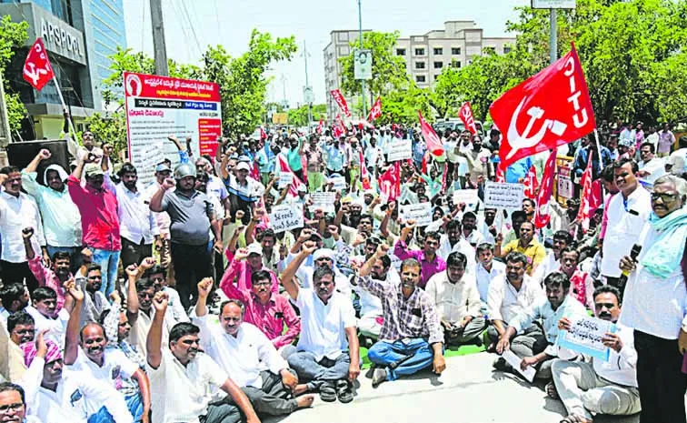 Electricity employees hold a grand dharna in Tirupati