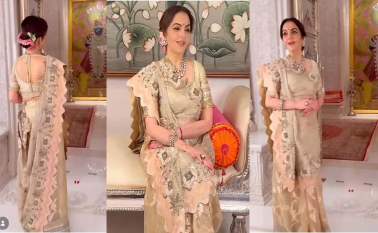 Nita Ambanis latest Krishna inspired ivory saree look is rooted in tradition 3