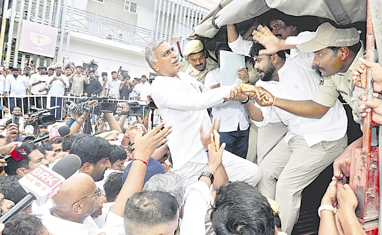 Harish Rao Falls During Police Arrest At Telangana Bhavan
