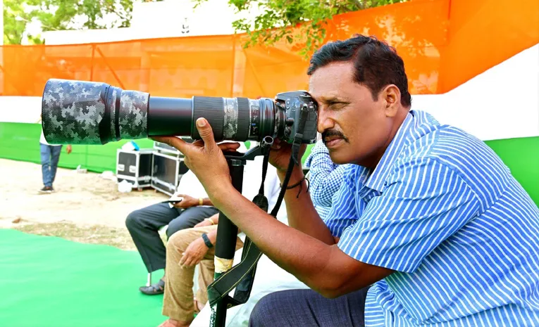 Sakshi Photographer Bajrang Wins Second Prize in State-Level Photography Contest