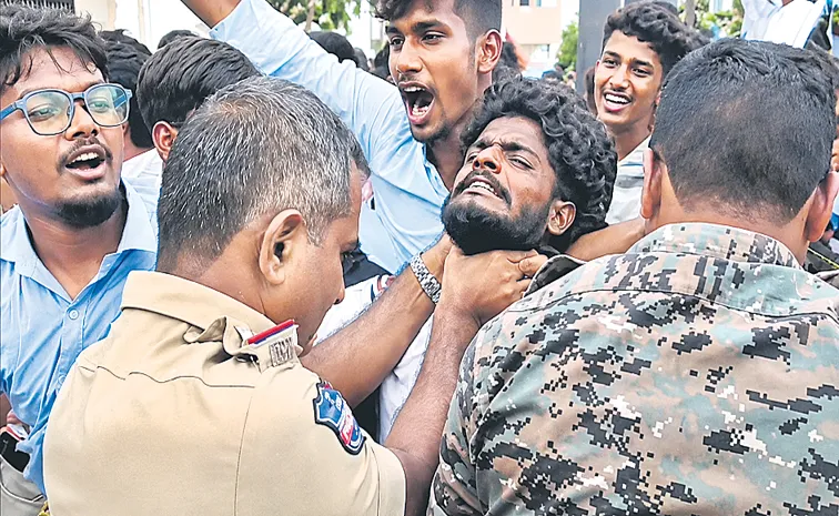 Police hold students throats to prevent a siege at Collectorate