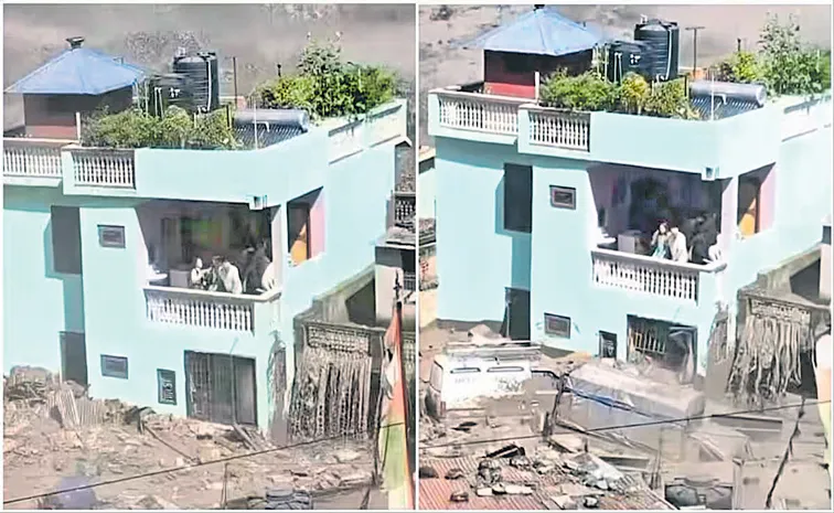 Family Trapped On Balcony Amid Raging Floodwaters In Nepal