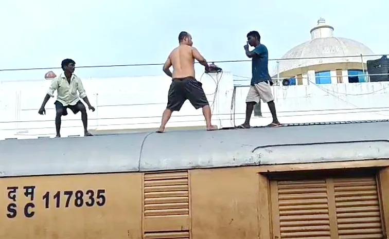Renigunta Railway Station Suicide Attempt High Tension Line Tirupathi