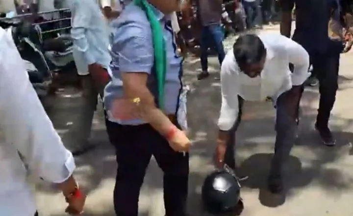Ex Karnataka MLA smashes mans helmet after he rides through BJP protest