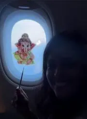 Indian artist slammed for painting on airplane window Goes Viral