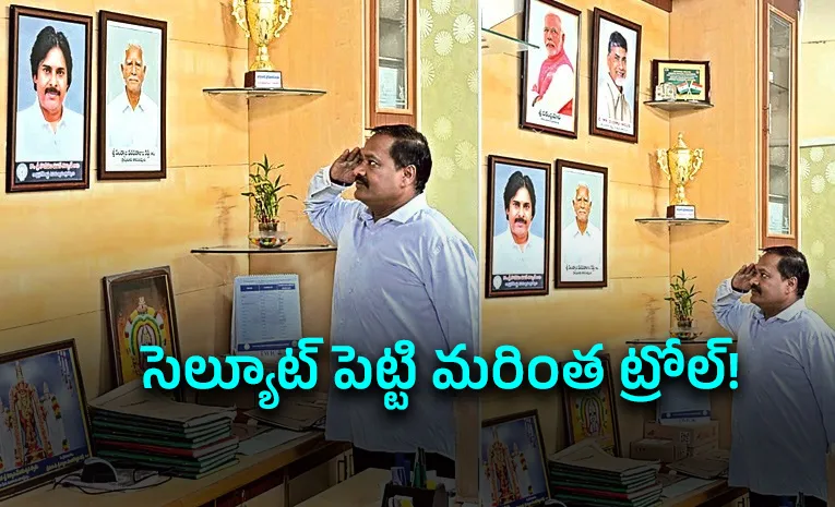 Municipal Commissioner Srinivasa Viswanath Saluting a Photo Of Pawan Kalyan