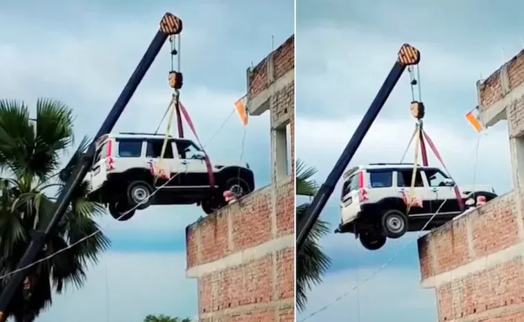 Mahindra Scorpio Owner Uses Crane To Park SUV On Rooftop, Check The Reason