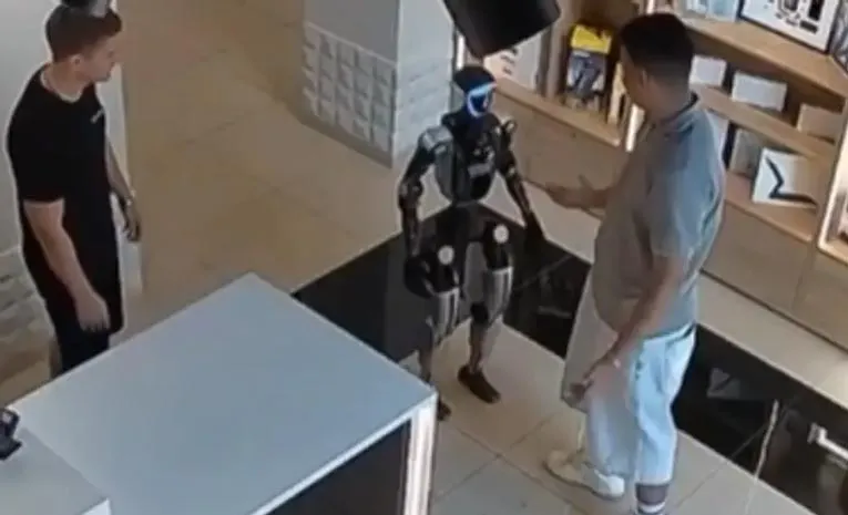 Russian Humanoid Robot Tries to Kick Man After Being Pushed Video Goes Viral1