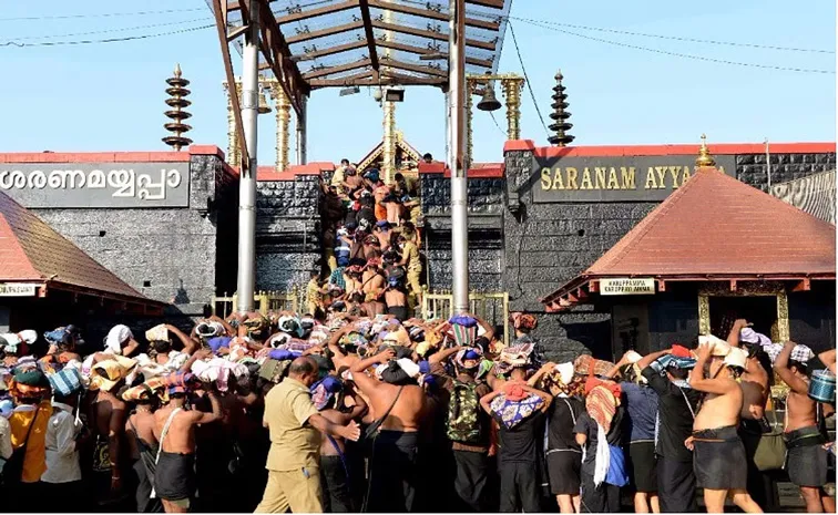 శబరిమల యాత్రికులకు రూ.2 లక్షల జీవిత బీమా 