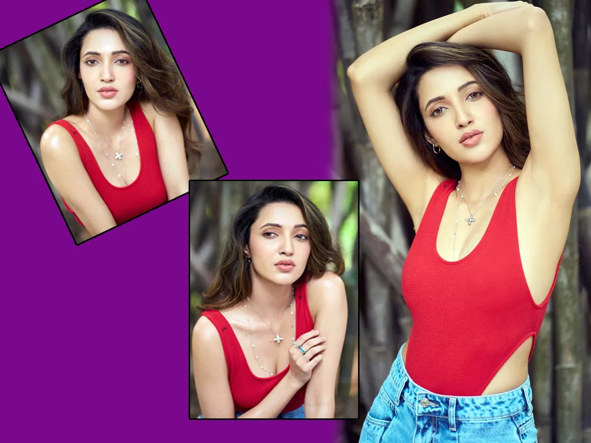 Neha Shetty poses in red top