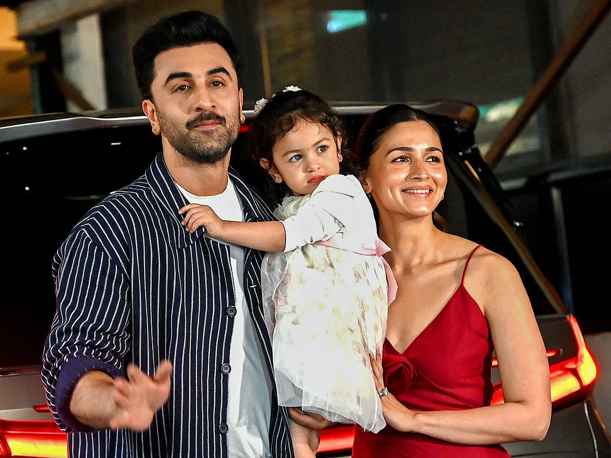 Actor Ranbir Kapoor with his daughter Raha Kapoor poses for pictures