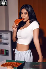 Nabha Natesh is eating pizza in a white skirt7