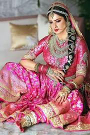 Legendary Rekha turns in a  pink gold saree looks stunning